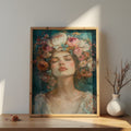 Floral wall art featuring a serene woman in a pink flower crown against a teal background, exuding tranquility